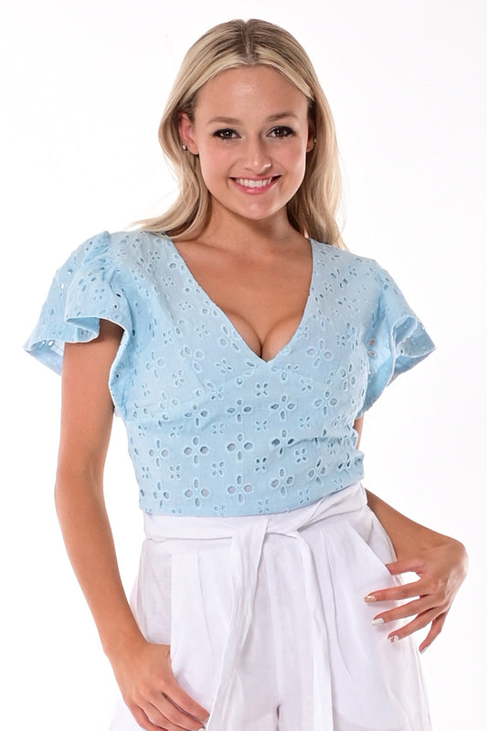AZUCAR LADIES SOLID EYELET V-NECK BLOUSE - lt. blue on a model - LCB1716